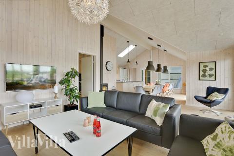 Opholdsrum med plads til 18 i luksushus nr. 379.