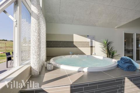 Nyd varmen i spaen i luksushus nr. 377 i Nordsjælland