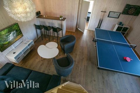 Dyst i sommerhusets aktivitetsrum, når I besøger luksushus nr. 377 i Nordsjælland.