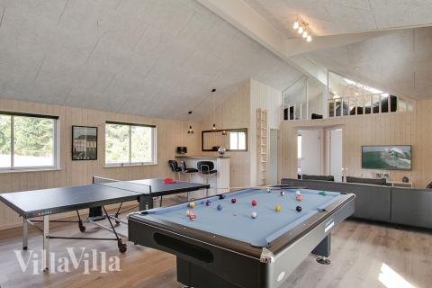 Luksushus 394 til 22 personer byder på et stort aktivitetsrum med bl.a. billard og dart