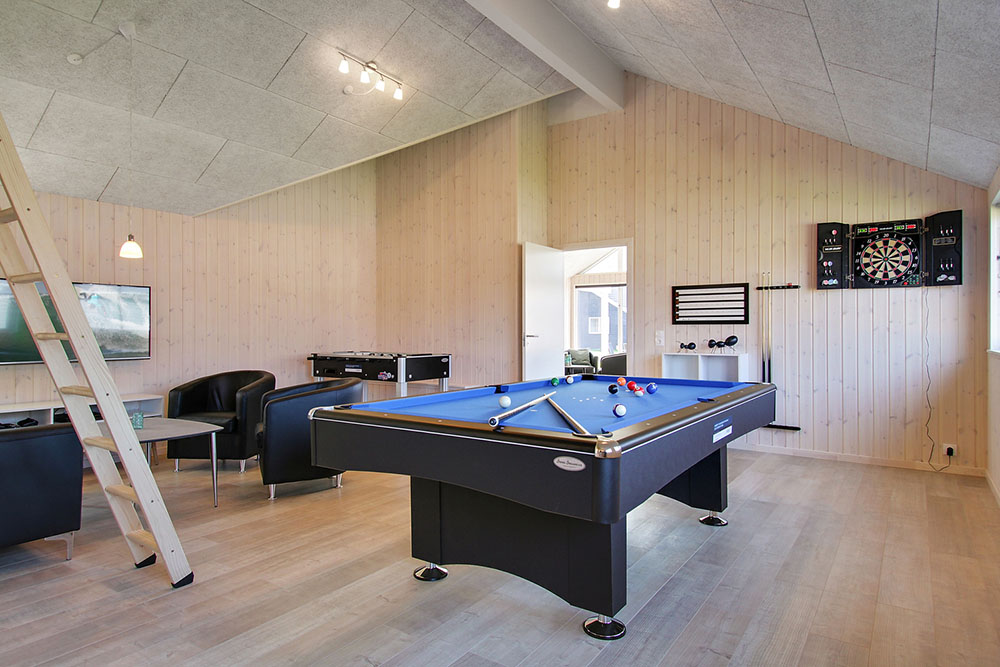 Ud over de mange timer, man kan bruge i husets pool-afdeling, så byder luksushus 704 også på billard/bordtennis og dart