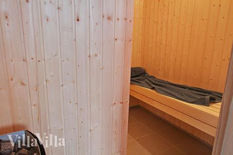 Nyd varmen i saunaen i luksushus nr. 708 til 12 personer