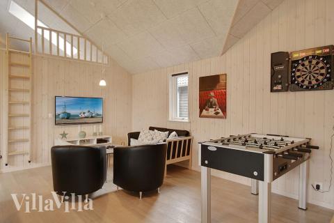 Aktivitetsrum i luksushus nr. 709 med 6 soveværelser og plads til 16 personer.