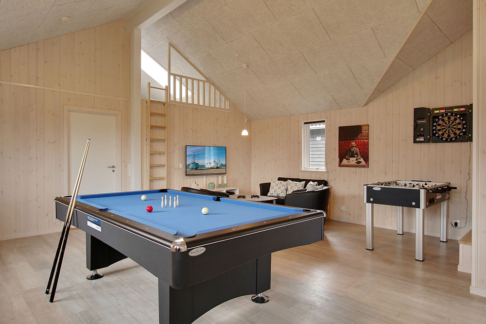 Ud over de mange timer, man kan bruge i husets pool-afdeling, så byder luksushus 709 også på billard/bordtennis og dart