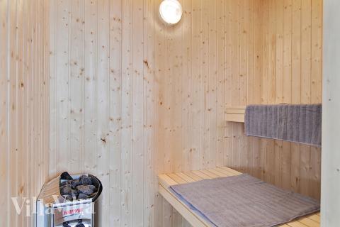 Nyd varmen i saunaen i luksushus nr. 710 til 18 personer