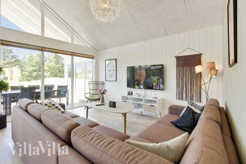 Opholdsrum med plads til 16 i luksushus nr. 396.