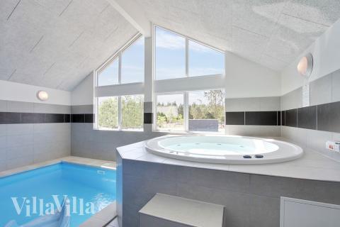 Nyd varmen i spaen i luksushus nr. 396 i Vestjylland