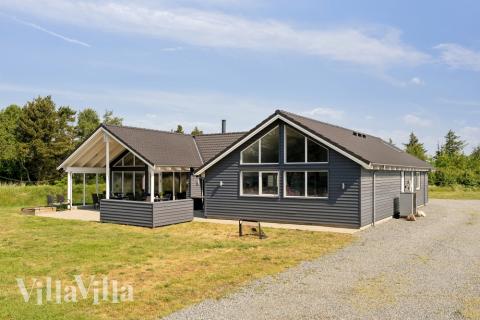 Dette skønne poolhus nr. 396 med plads til 16 personer ligger i Vestjylland