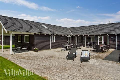 Nyd en grillaften på terrassen i luksushus nr. 714 i Tyskland