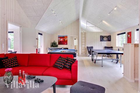 Dyst i sommerhusets aktivitetsrum, når I besøger luksushus nr. 715 i Tyskland.