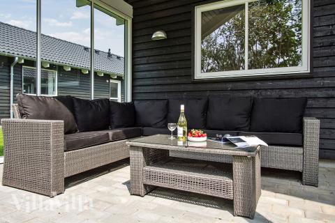 Nyd en grillaften på terrassen i luksushus nr. 715 i Tyskland