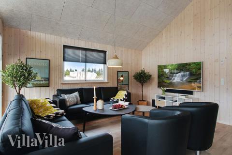 Det store lyse opholdrum i luksushus nr. 399 til 18.