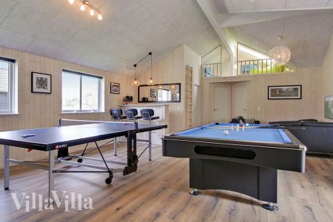 Ud over de mange timer, man kan bruge i husets pool-afdeling, så byder luksushus 707 også på billard/bordtennis og dart