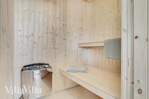 Nyd varmen i saunaen i luksushus nr. 405 til 18 personer