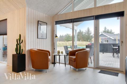 Opholdsrum med plads til 22 i luksushus nr. 407.