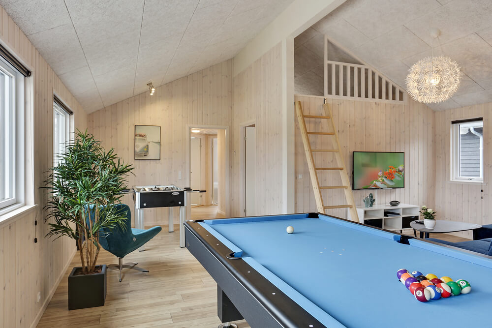 Ud over de mange timer, man kan bruge i husets pool-afdeling, så byder luksushus 408 også på billard/bordtennis og dart