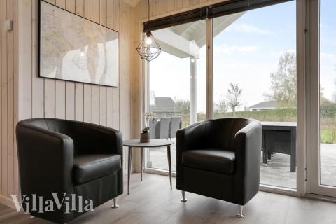 Opholdsrum med plads til 18 i luksushus nr. 392.