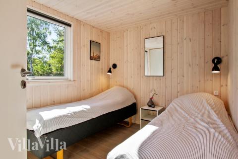 Et af de 8 soveværelser i luksushus nr. 410