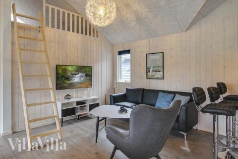 Dyst i sommerhusets aktivitetsrum, når I besøger luksushus nr. 409 i Vestjylland.