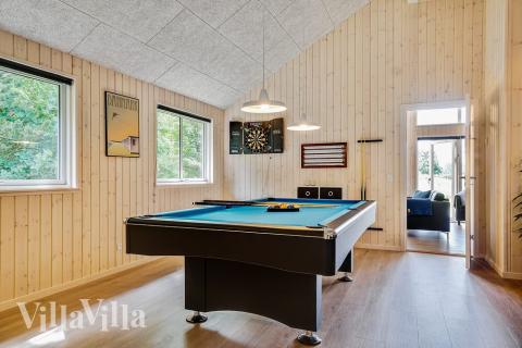 Ud over de mange timer, man kan bruge i husets pool-afdeling, så byder luksushus 416 også på billard/bordtennis og dart