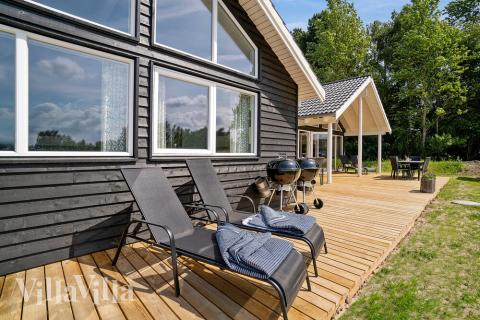 Luksushus nr. 416 har en dejlig terrasse med gode havemøbler til 16 personer.