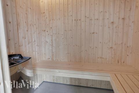 Nyd varmen i saunaen i luksushus nr. 403 til 24 personer