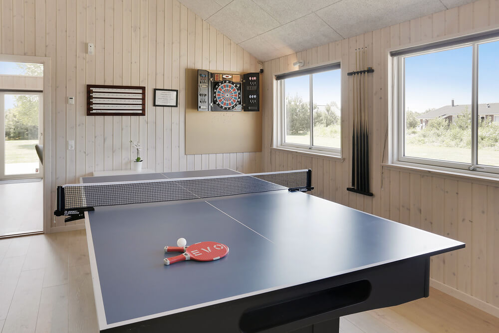 Ud over de mange timer, man kan bruge i husets pool-afdeling, så byder luksushus 413 også på billard/bordtennis og dart