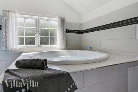 Nyd varmen i spaen i luksushus nr. 419 i Vestjylland