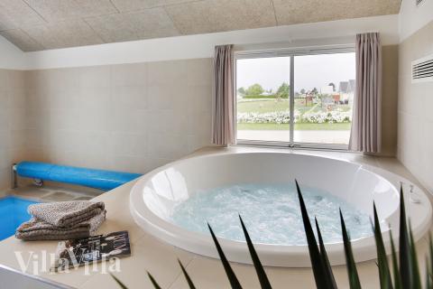 Nyd varmen i spaen i luksushus nr. 418 i Fyn og øer