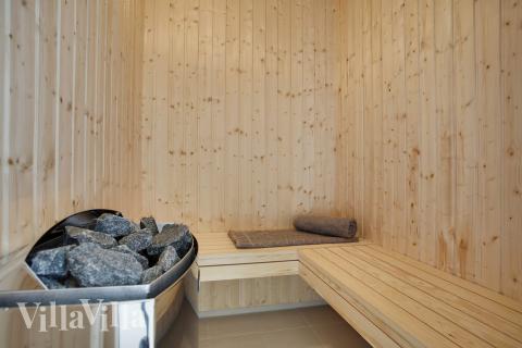 Nyd varmen i saunaen i luksushus nr. 418 til 14 personer