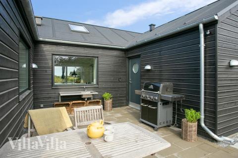 Luksushus nr. 411 har en dejlig terrasse med gode havemøbler til 14 personer.