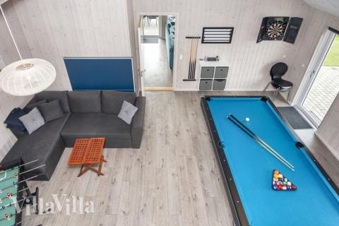 Aktivitetsrum i luksushus nr. 421 med 6 soveværelser og plads til 16 personer.