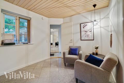 Opholdsrum med plads til 22 i luksushus nr. 414.