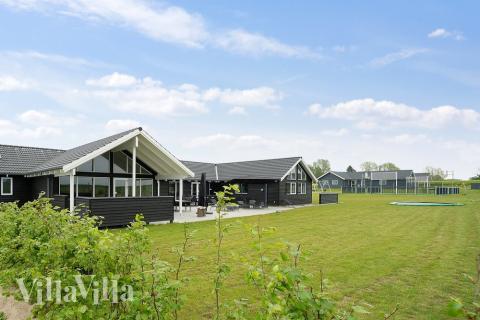 Dette skønne poolhus nr. 430 med plads til 30 personer ligger i Fyn og øer