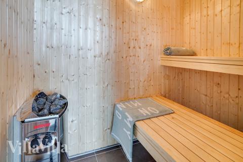 Nyd varmen i saunaen i luksushus nr. 717 til 16 personer