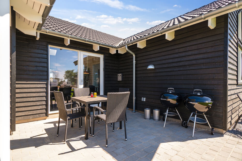 Nyd en grillaften på terrassen i luksushus nr. 717 i Tyskland