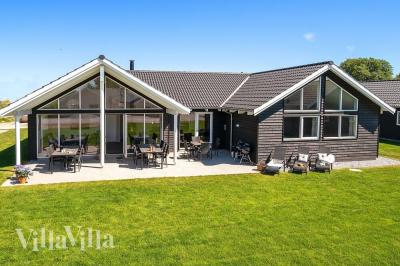 Dette skønne poolhus nr. 717 med plads til 16 personer ligger i Tyskland