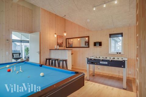 Aktivitetsrum i luksushus nr. 723 med 4 soveværelser og plads til 10 personer.