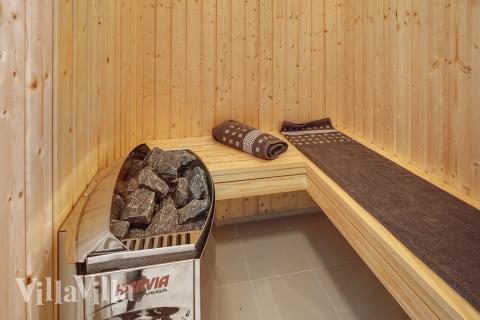 Nyd varmen i saunaen i luksushus nr. 722 til 10 personer