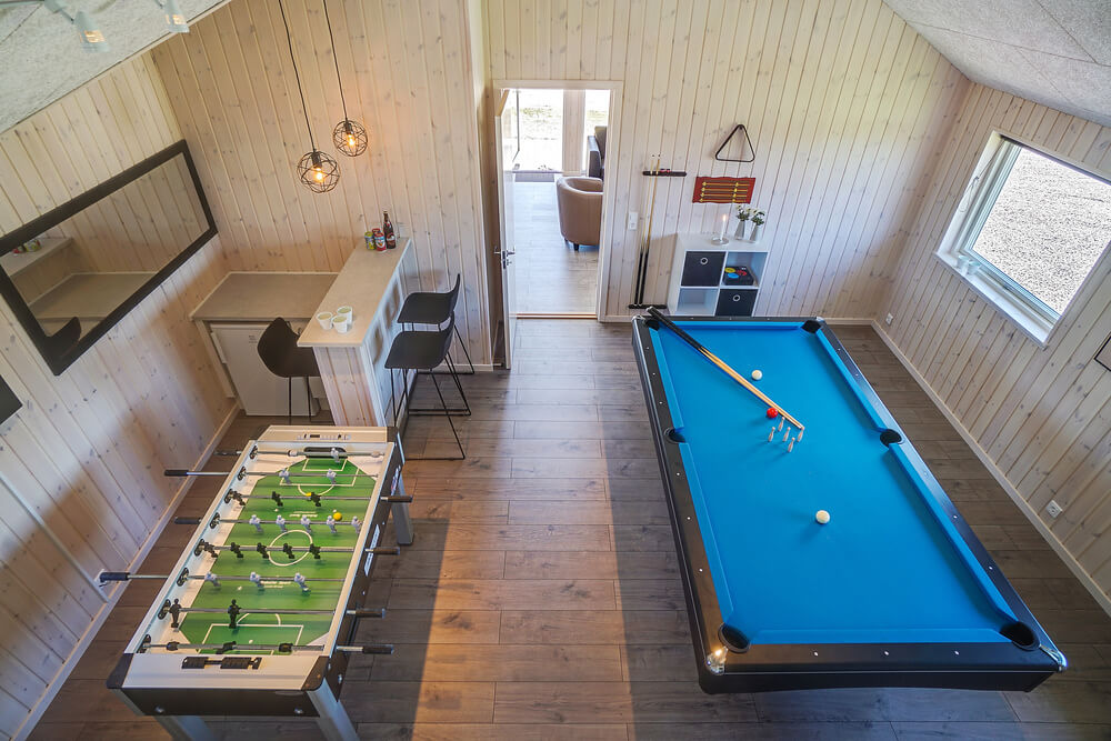 Ud over de mange timer, man kan bruge i husets pool-afdeling, så byder luksushus 722 også på billard/bordtennis og dart