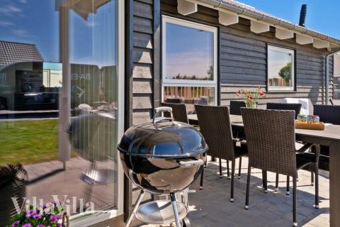 Luksushus nr. 718 har en dejlig terrasse med gode havemøbler til 12 personer.