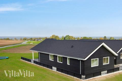 Dette skønne poolhus nr. 424 med plads til 14 personer ligger i Fyn og øer