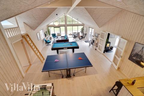 Luksushus 429 til 30 personer byder på et stort aktivitetsrum med bl.a. billard og dart