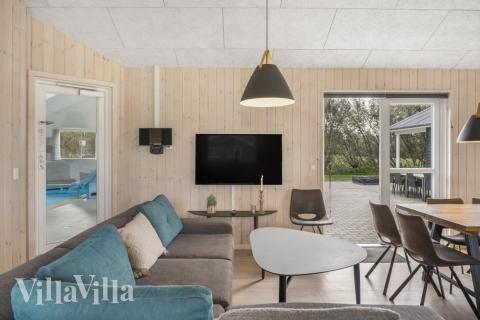 Sofahjørnet i luksushus 440 i Nordjylland.