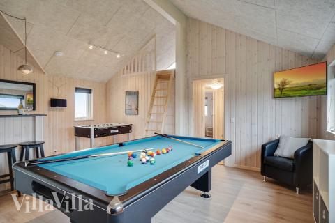 Ud over de mange timer, man kan bruge i husets pool-afdeling, så byder luksushus 719 også på billard/bordtennis og dart