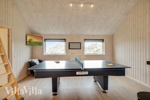 Aktivitetsrum i luksushus nr. 719 med 4 soveværelser og plads til 10 personer.