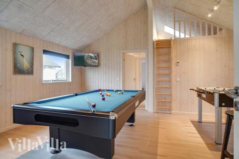 Aktivitetsrum i luksushus nr. 724 med 4 soveværelser og plads til 10 personer.