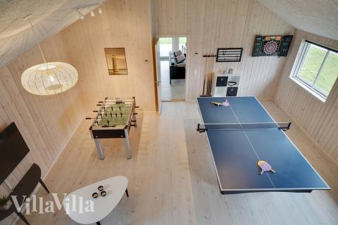 Ud over de mange timer, man kan bruge i husets pool-afdeling, så byder luksushus 721 også på billard/bordtennis og dart