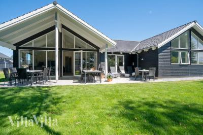 Dette skønne poolhus nr. 720 med plads til 18 personer ligger i Tyskland