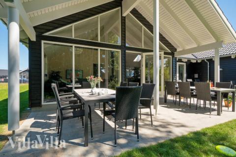 Nyd en grillaften på terrassen i luksushus nr. 720 i Tyskland